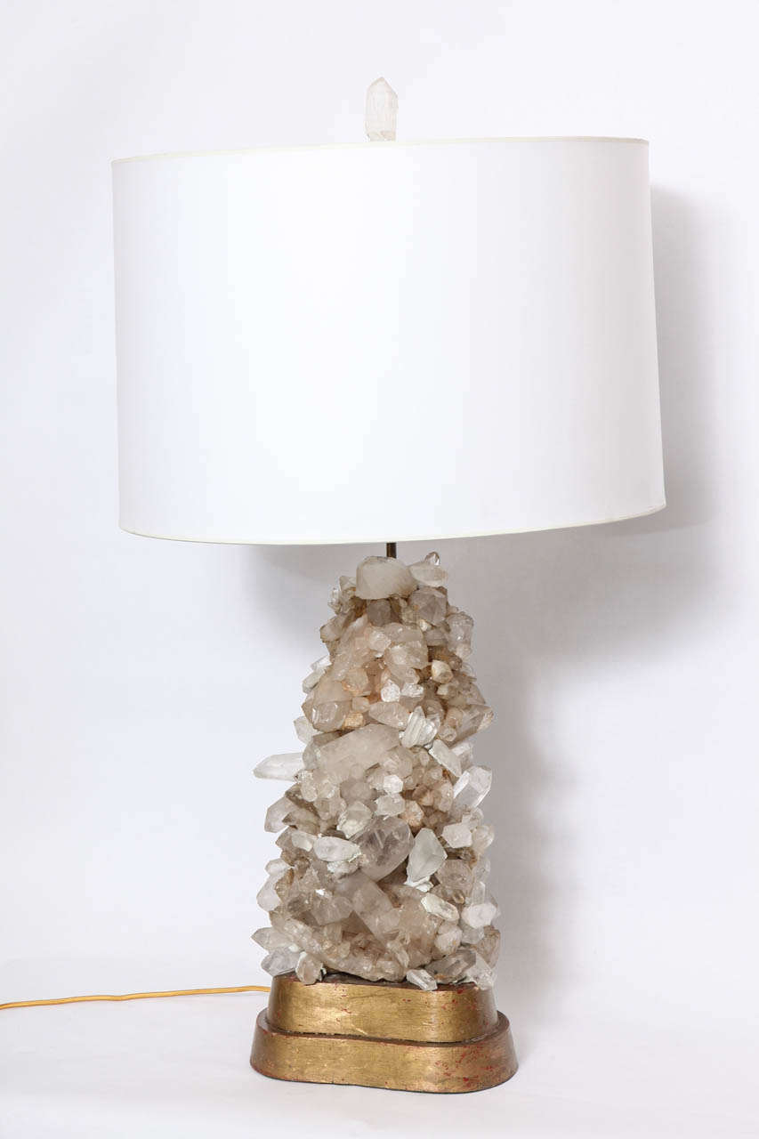 A 1950's Modernist sculptural rock crystal table lamp by Carole Stupell.