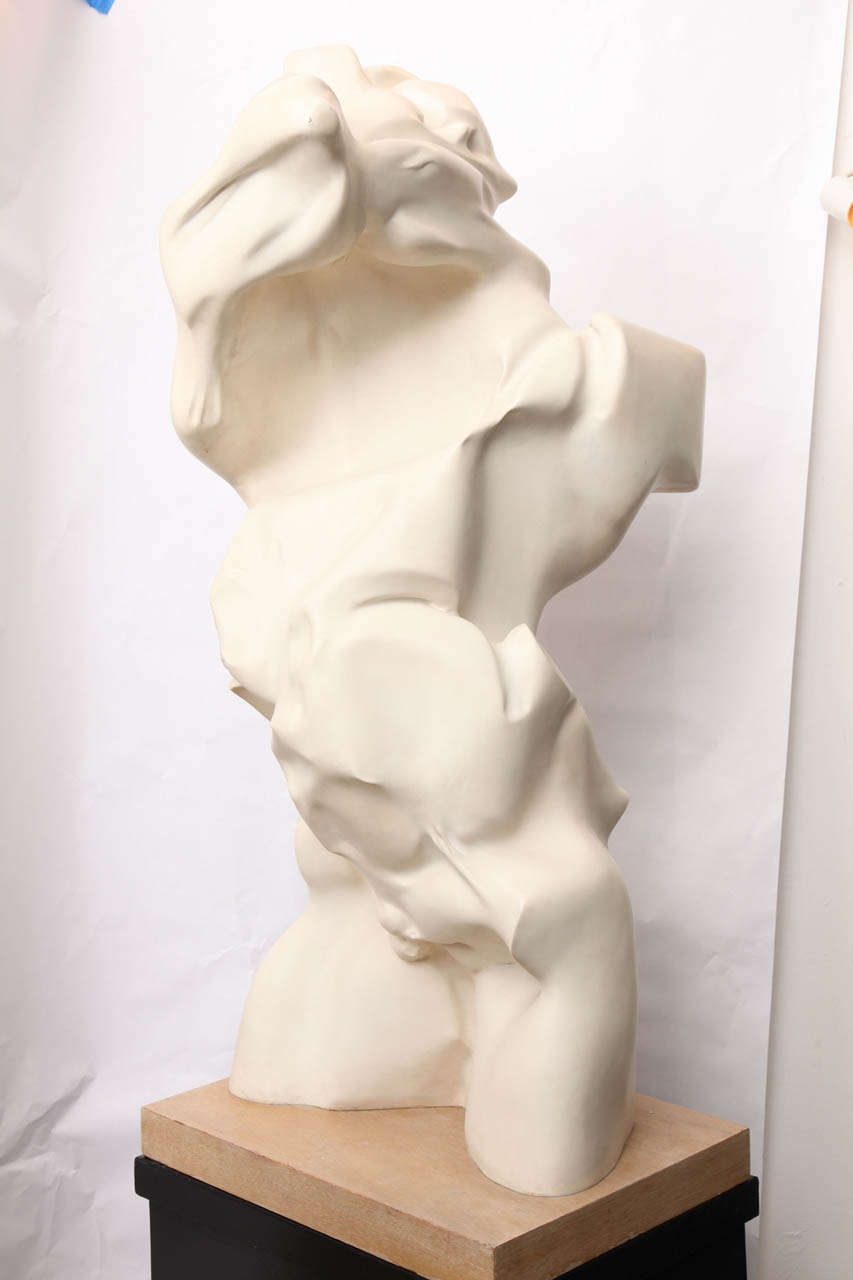 A 1960s Italian Futurist abstract torso sculpture and pedestal.