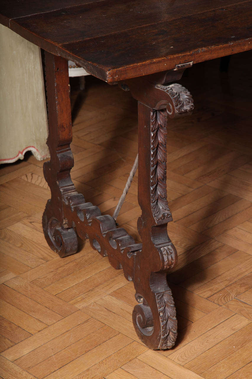 Wood A Spanish Colonial Style Library Table For Sale