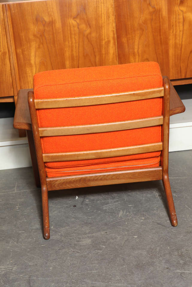 Mid-20th Century Pair of Teak Paddle Arm Chairs with Orange Fabric
