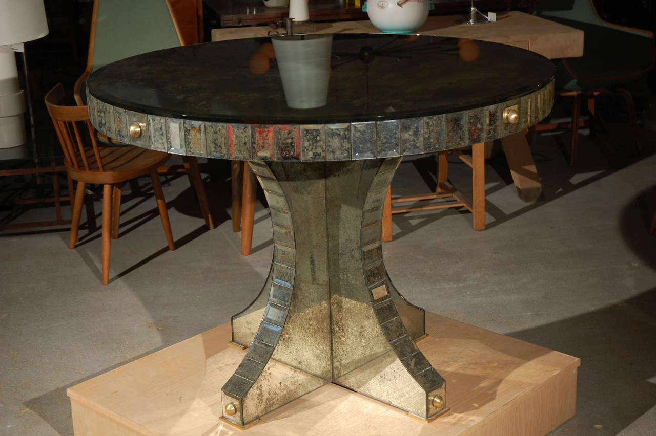 Center library table with antiqued mirror