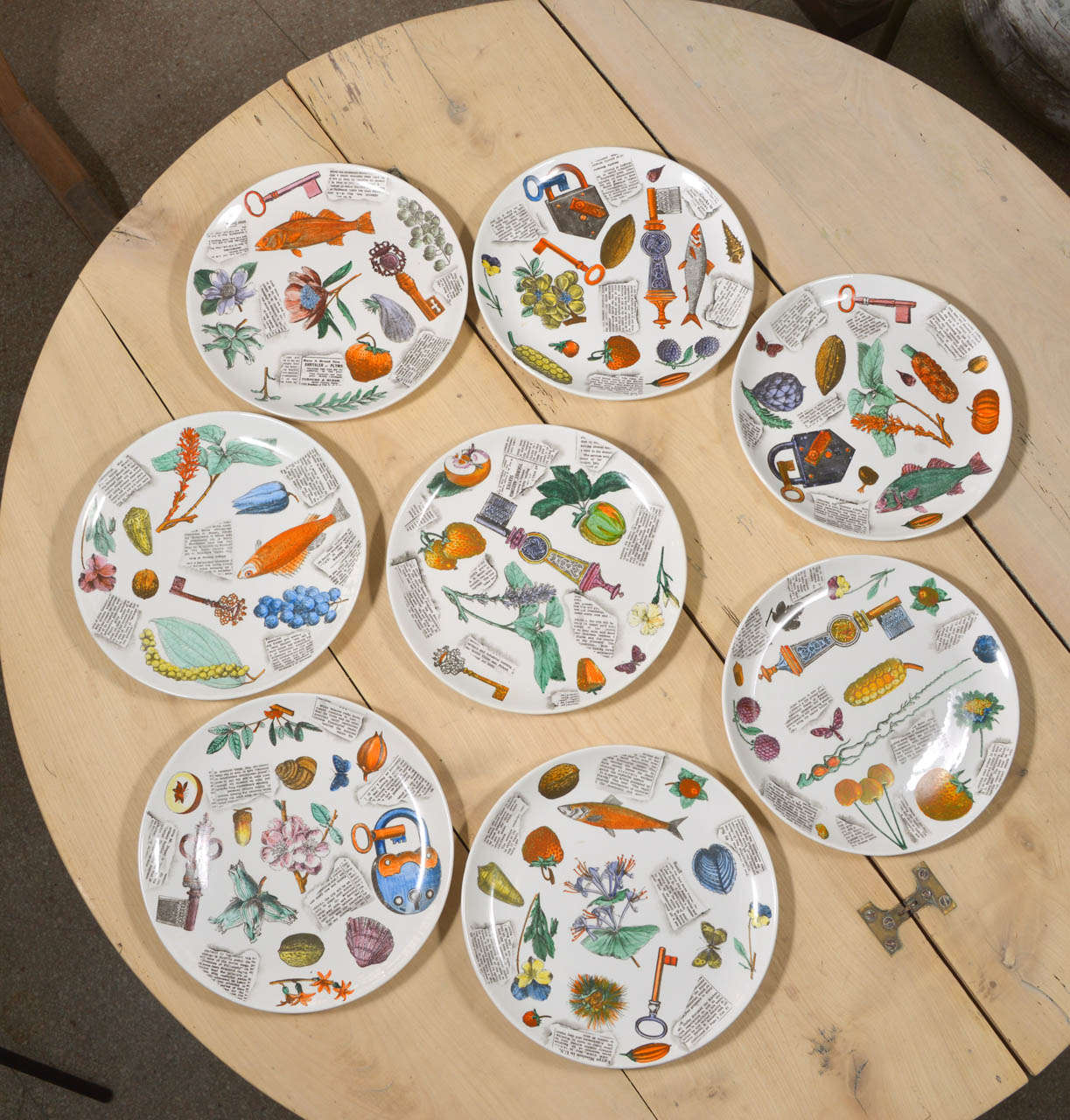 Fornasetti 10.50 in plates.
Perfect condition.
Every plate is different from the others.
Fabulous images.
Wonderful colors.
Simple shape.