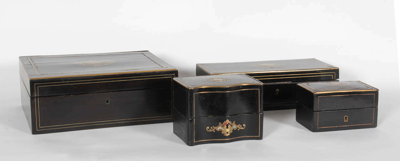 A Collection of a Tuque Black Lacquer Boxes