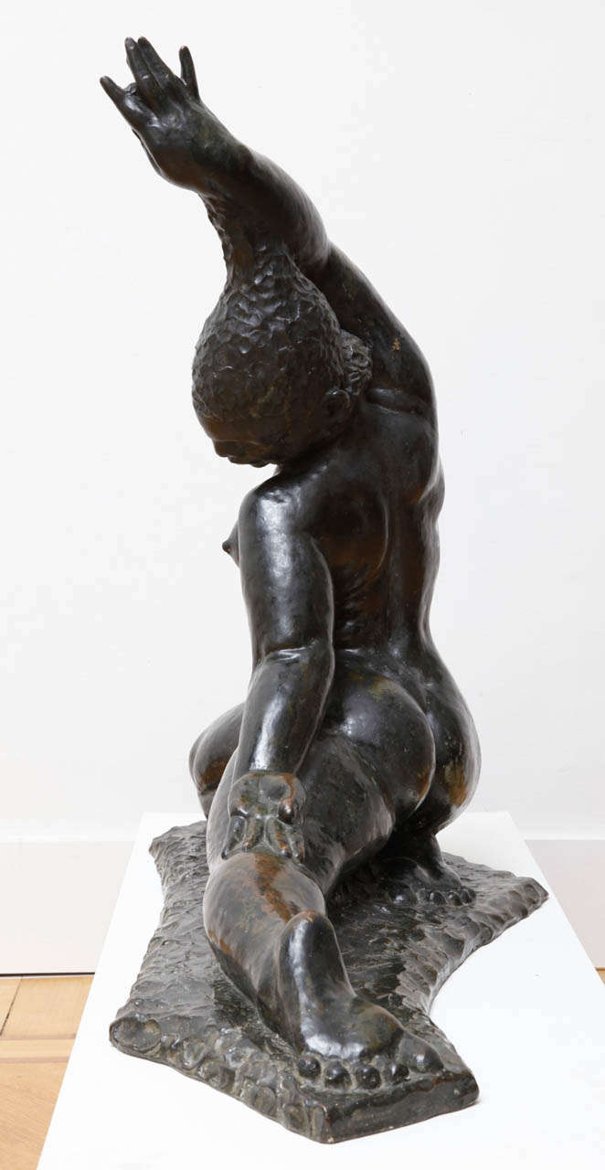 Patinated African Woman with Raised Arm For Sale