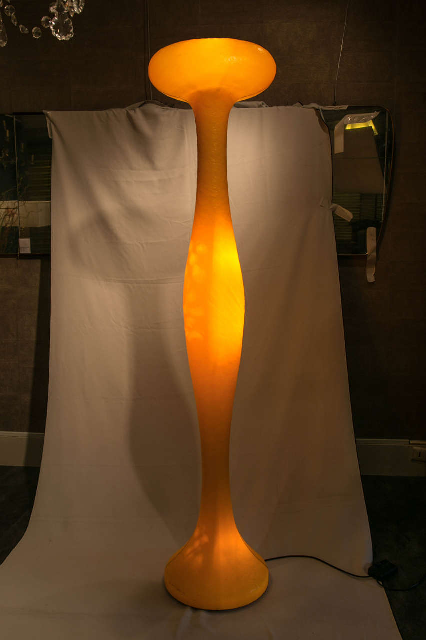 Very nice floor lamp with   four points of light 
It has a handmade light diffuser in ecological fiberglass, with a metallic inner structure which is removable for changing bulbs. 
Orange color.