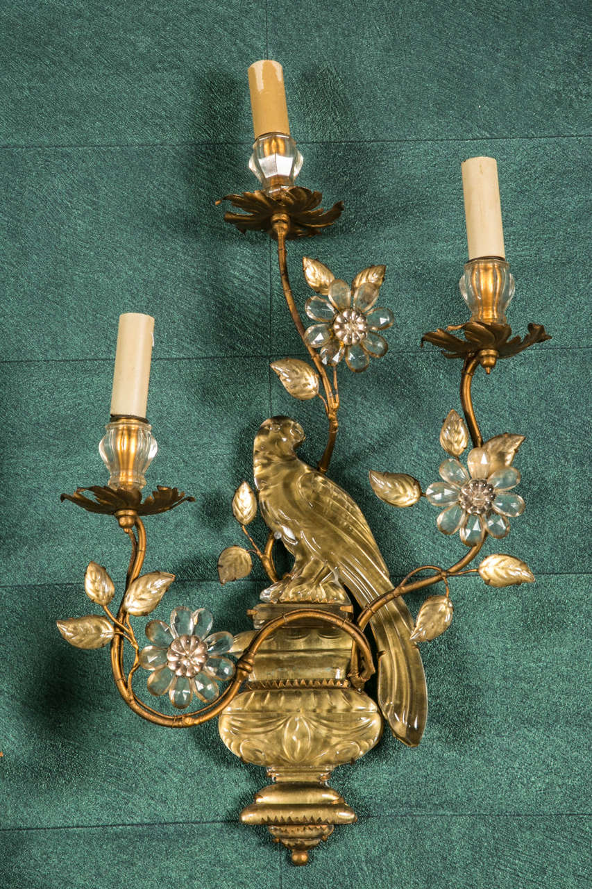 Pair of sconces in iron and crystal.
3 lights each.
By Maison Bagues Paris.