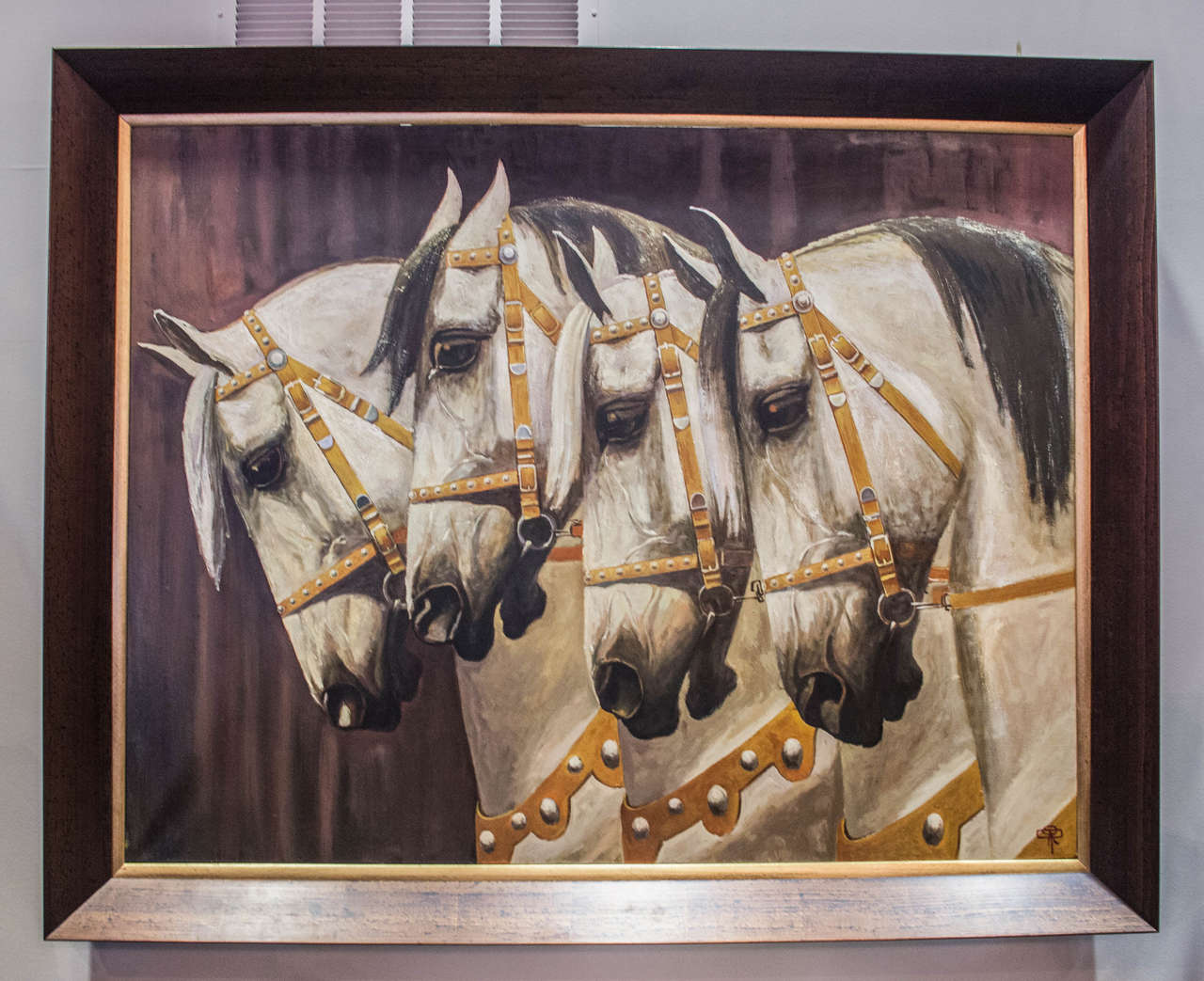 Powerful painting of four bridled horses. Oil on canvas. Signed. Slightly distressed wood frame with inner gold trim.