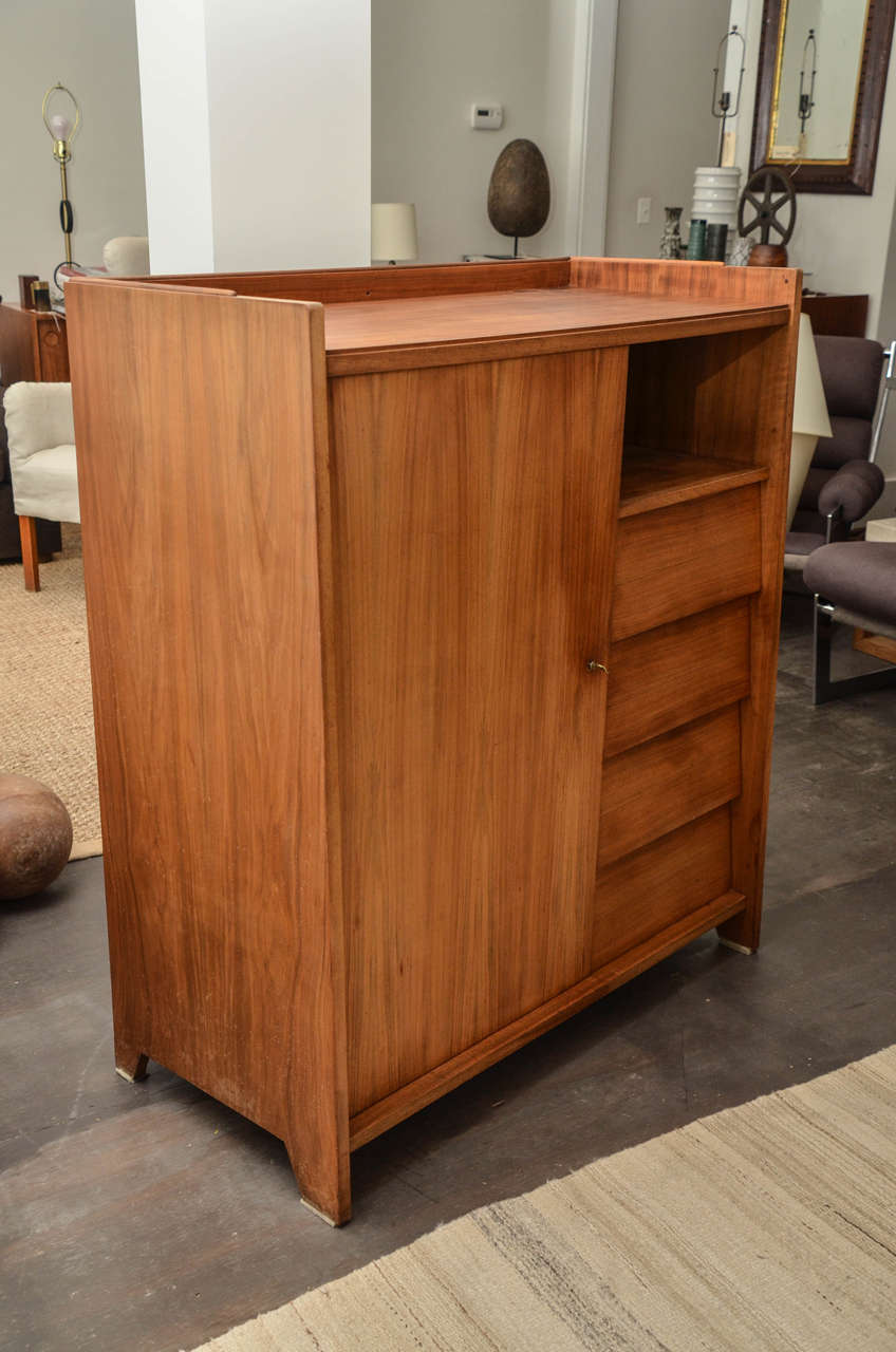 Vintage Mid-Century Walnut Chest by Flachet. 

Outstanding walnut chest consists of four well-proportioned drawers, a key-doored cabinet with shelves, and ample display space on the top. 

Great vintage condition. 