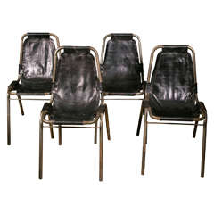 Four Charlotte Perriand Chairs in Steel and Black Leather, circa 1960