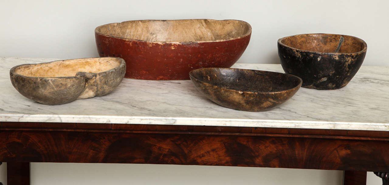 Fine assortment of 18th and early 19th century Swedish burl bowls; the largest with original red paint to the outer body and having nicely patinated interior and several lead plugs, the second deepest having original black painted exterior and