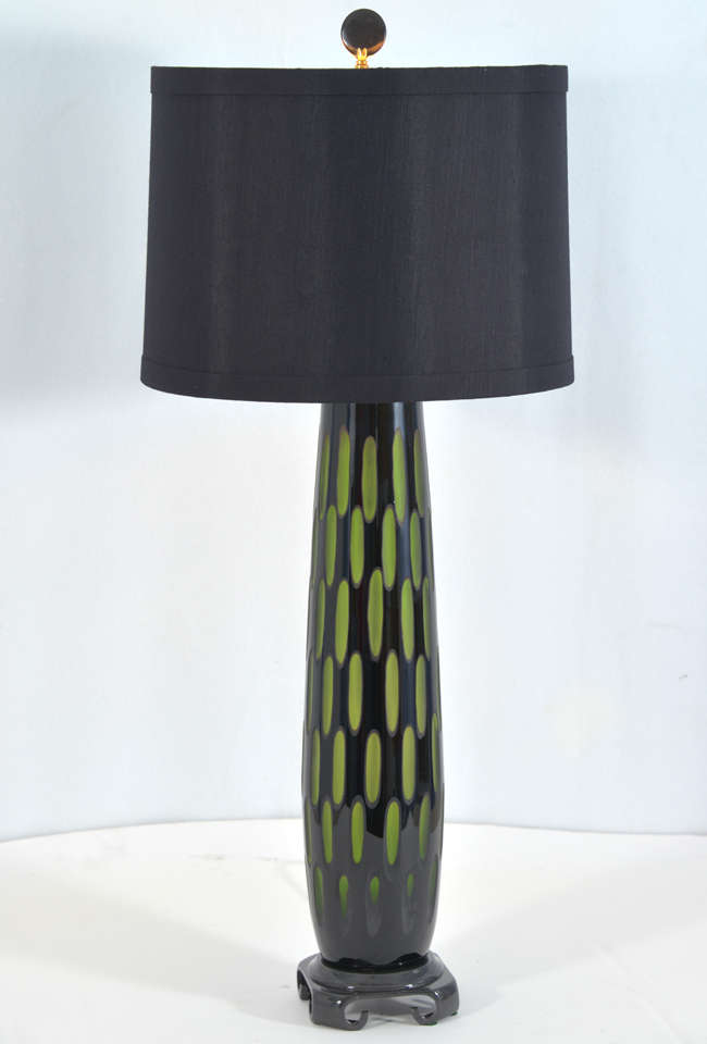 Mid Century Modern, 1950's, Cased Glass Black cut through  to Green Table Lamp on an Asian Style Bronze Finished Lamp Base, shown with a Black Drum shade.    Shade shown is 14