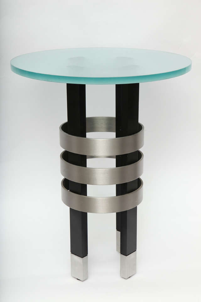 A pair of 1970s architectural side tables Glass not included