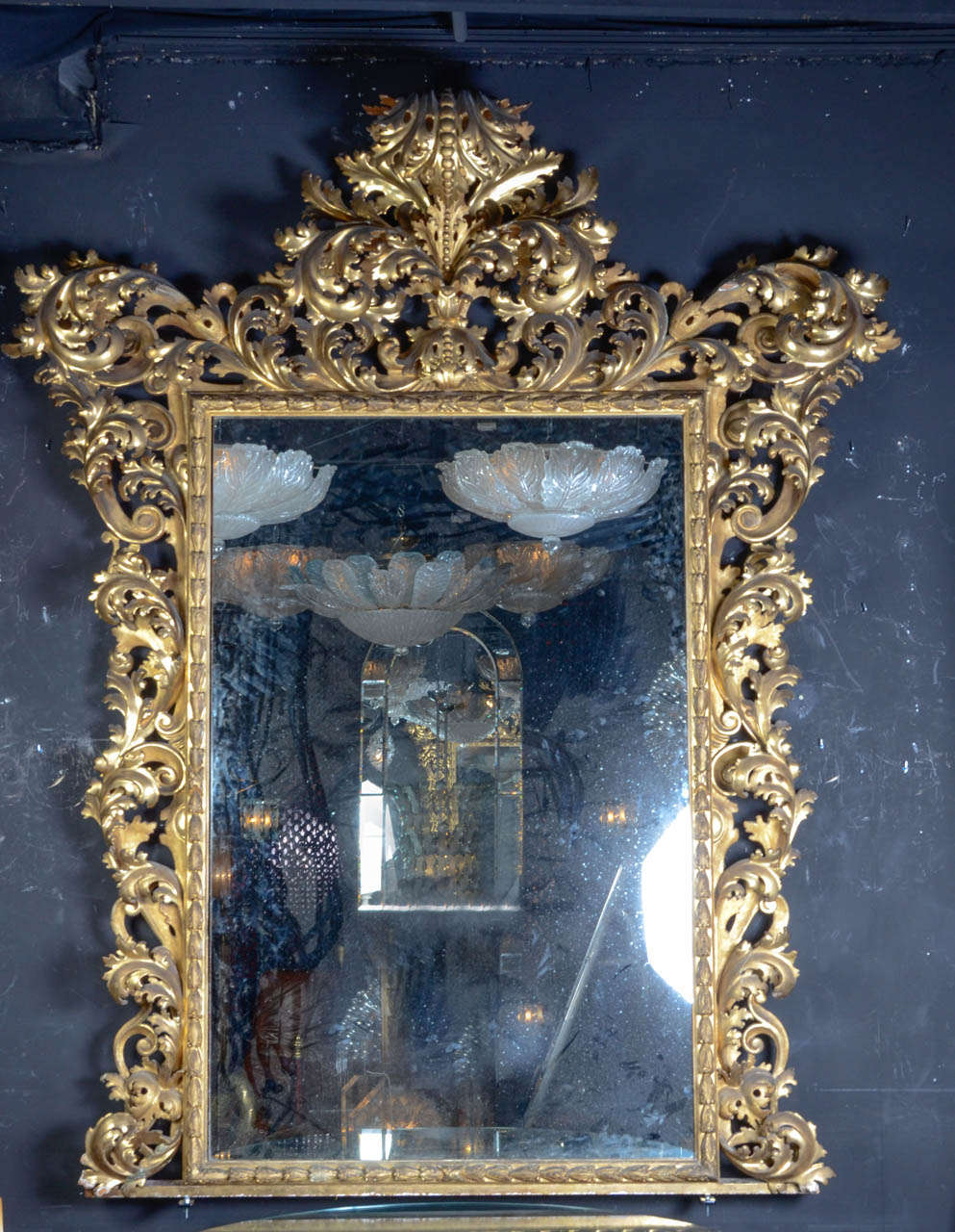 a big Venitian mirror , beautifully gilt carved wood,exceptionnal