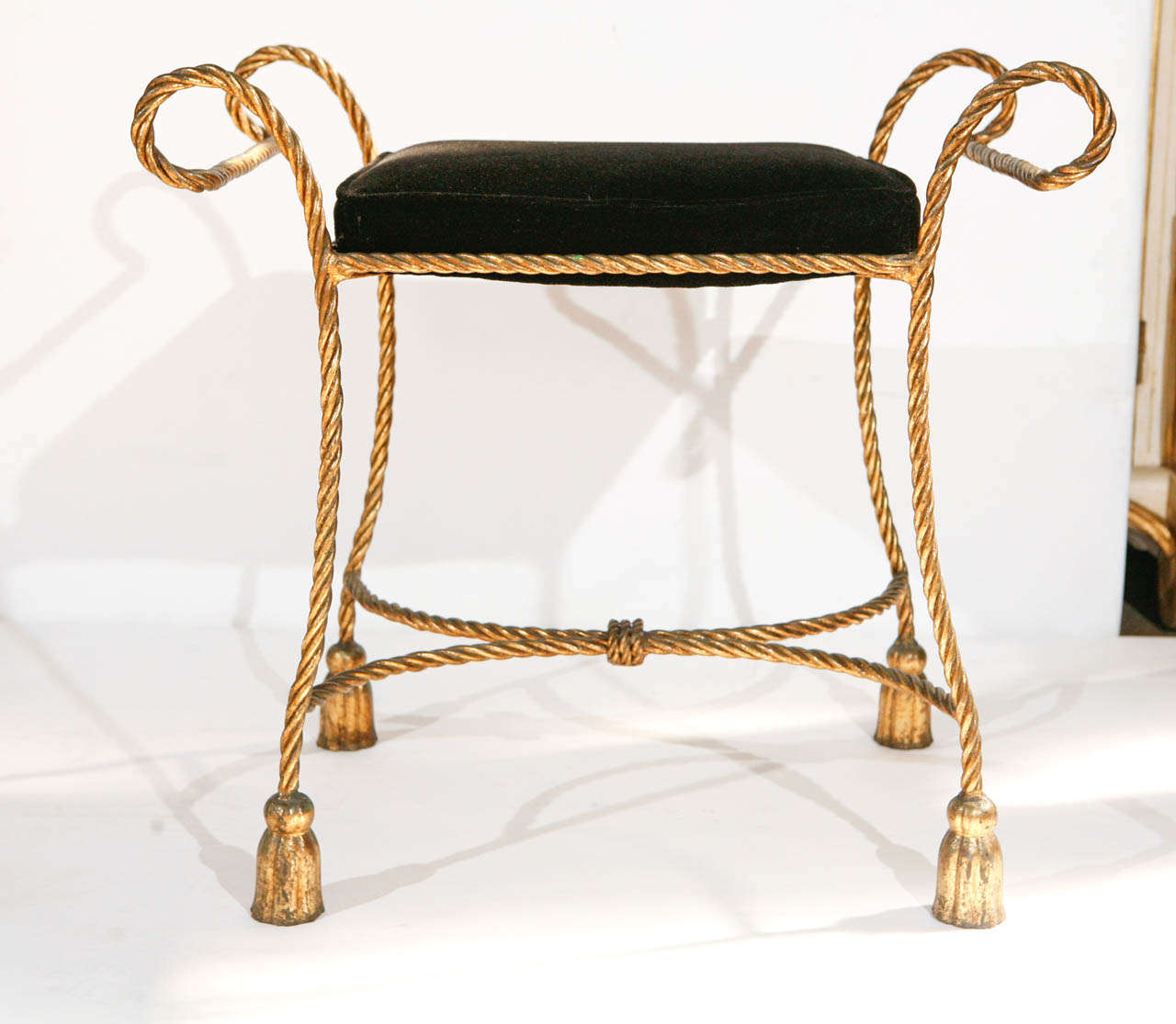 Vintage Italian gilded rope and tassel bench. Seat has been reupholstered in black mohair. Some wear to the gilding consistent with age.