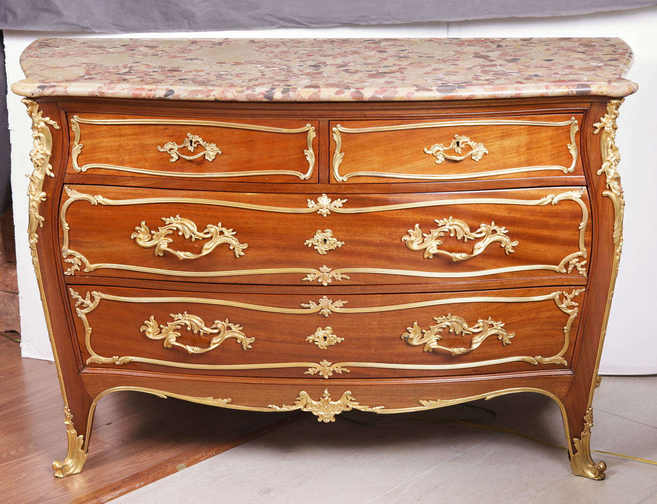 19th c French Louis XV bronze dore mounted kingwood commode. Breche De alep marble top. The commode is pictured in The Linke book by Christopher Payne.