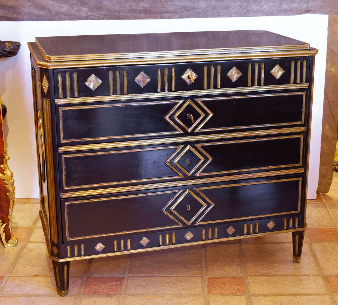 pair of 19th c Russian black lacquered and hand hammered brass inlayed commodes