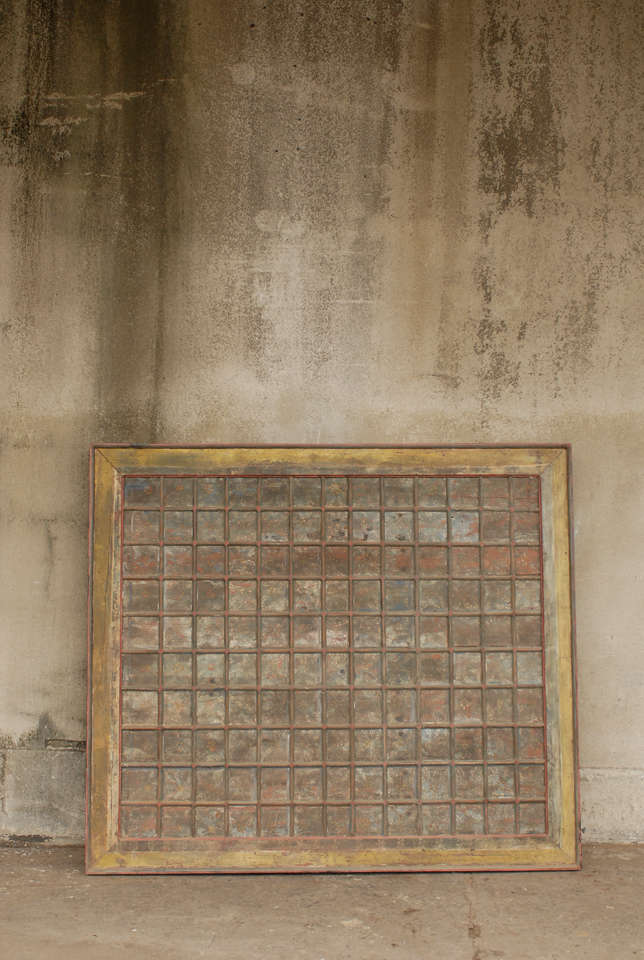 An early 20th century painted wood ceiling panel from Southern India with original painted surface and a later border molding.