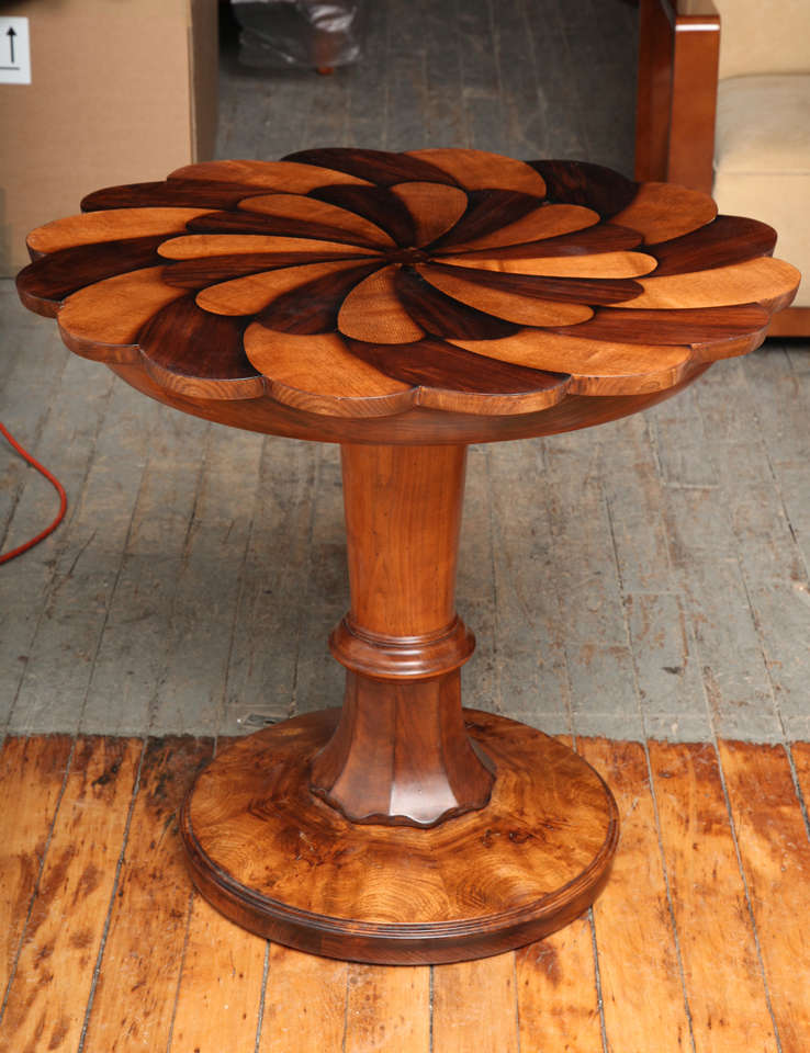 Unique custom designed Art Deco side/ center pedestal table in walnut root and mahogany intarsia design.
