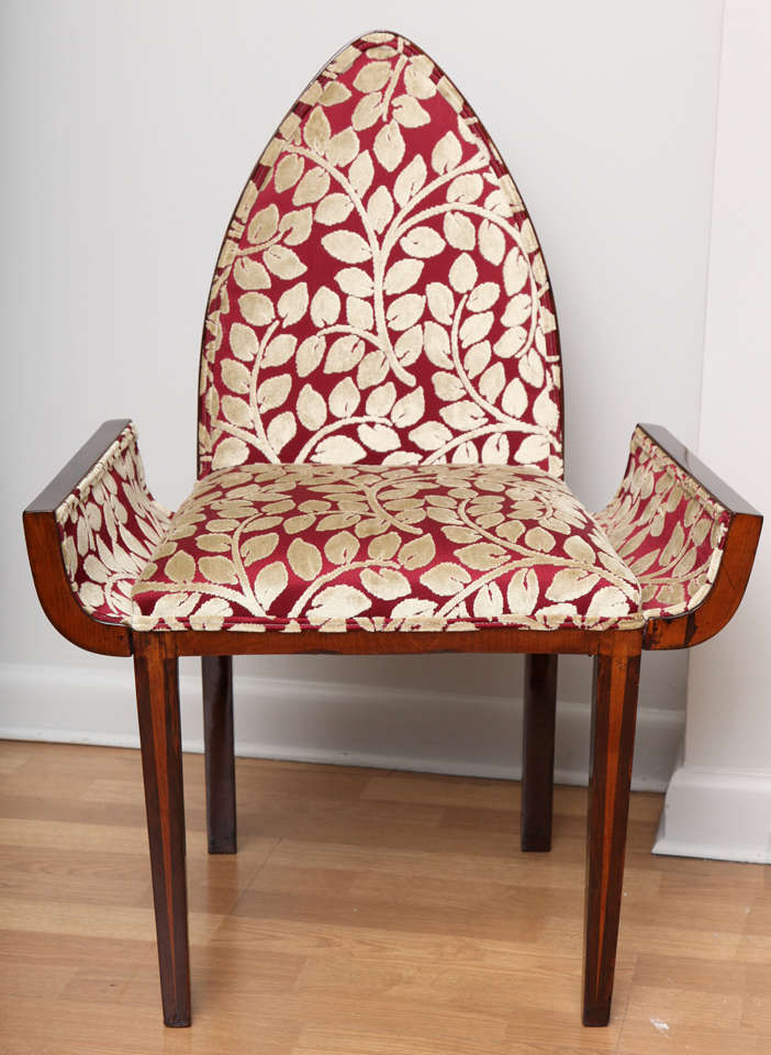 Unique Art Deco sculptural decorative chair from a J.E. Ruhlmann design. Pair available; priced individually.