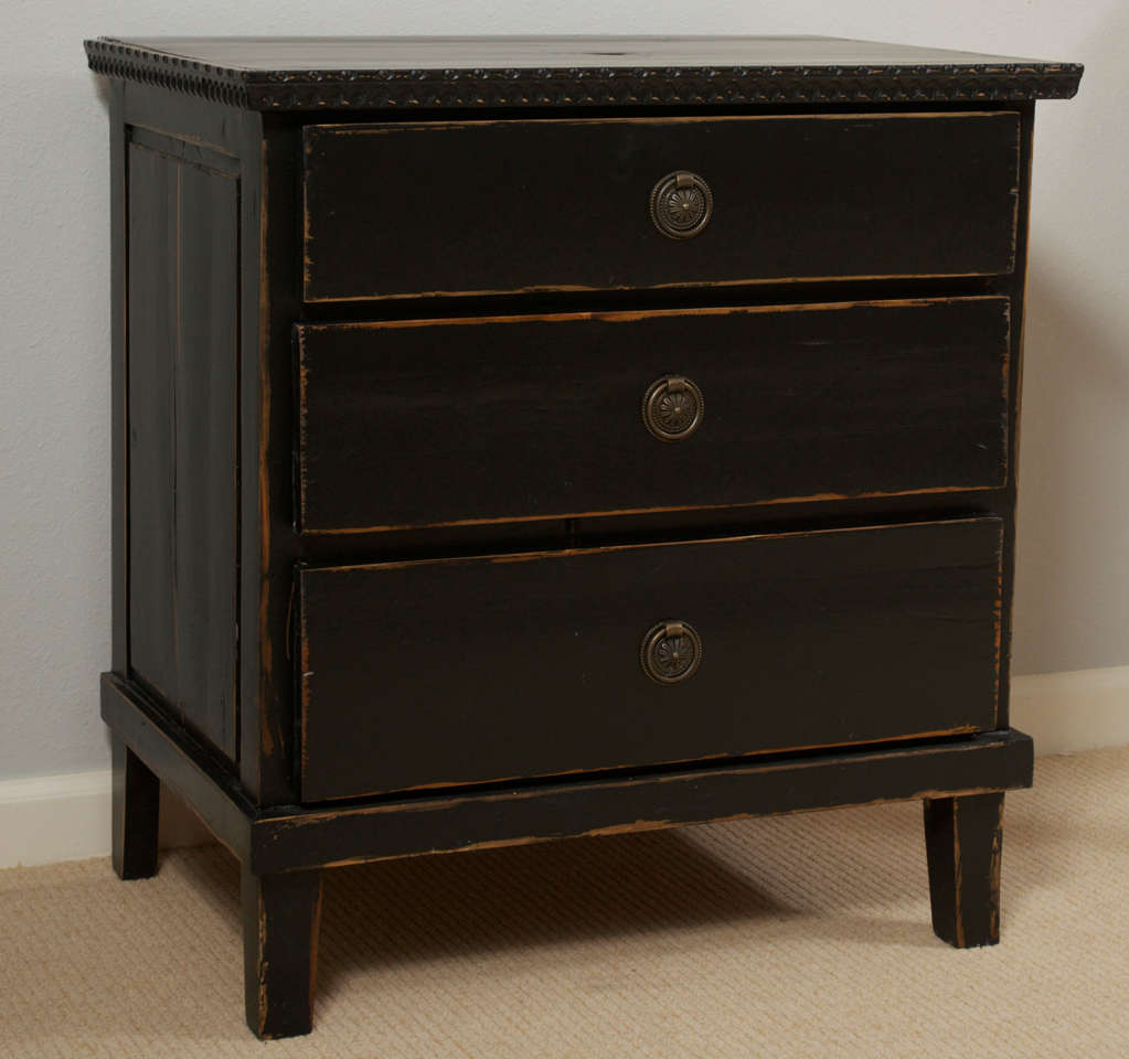 A pair of bedside commodes