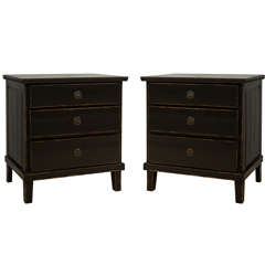 A pair of bedside commodes