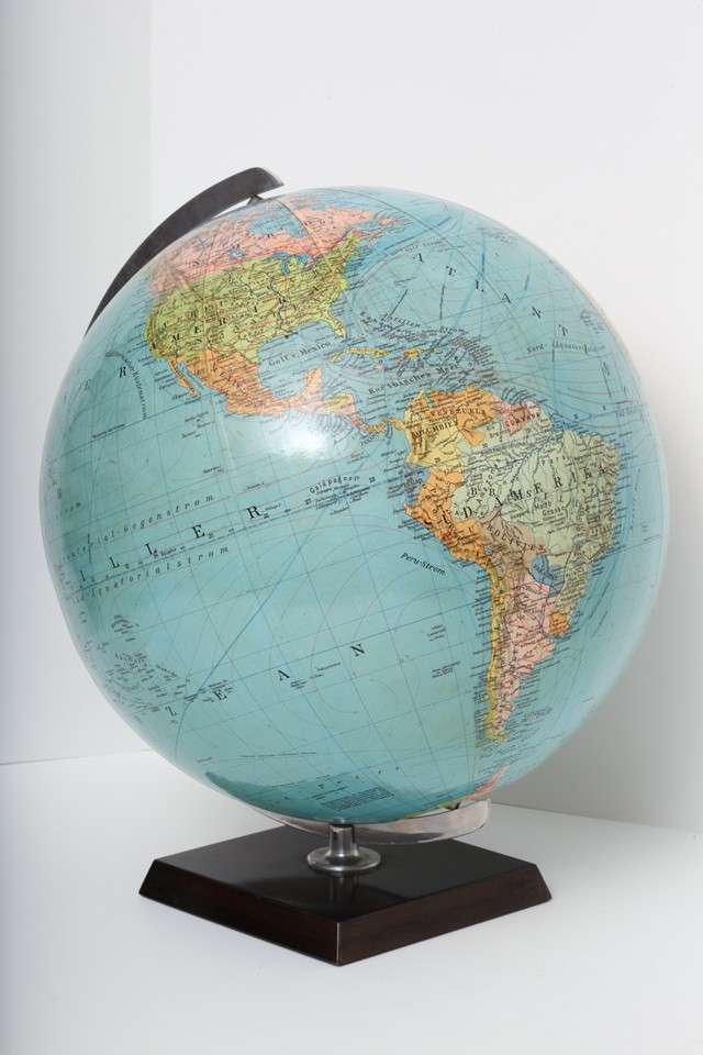 A mid-century globe by Columbus Erdglobus. Measuring 12