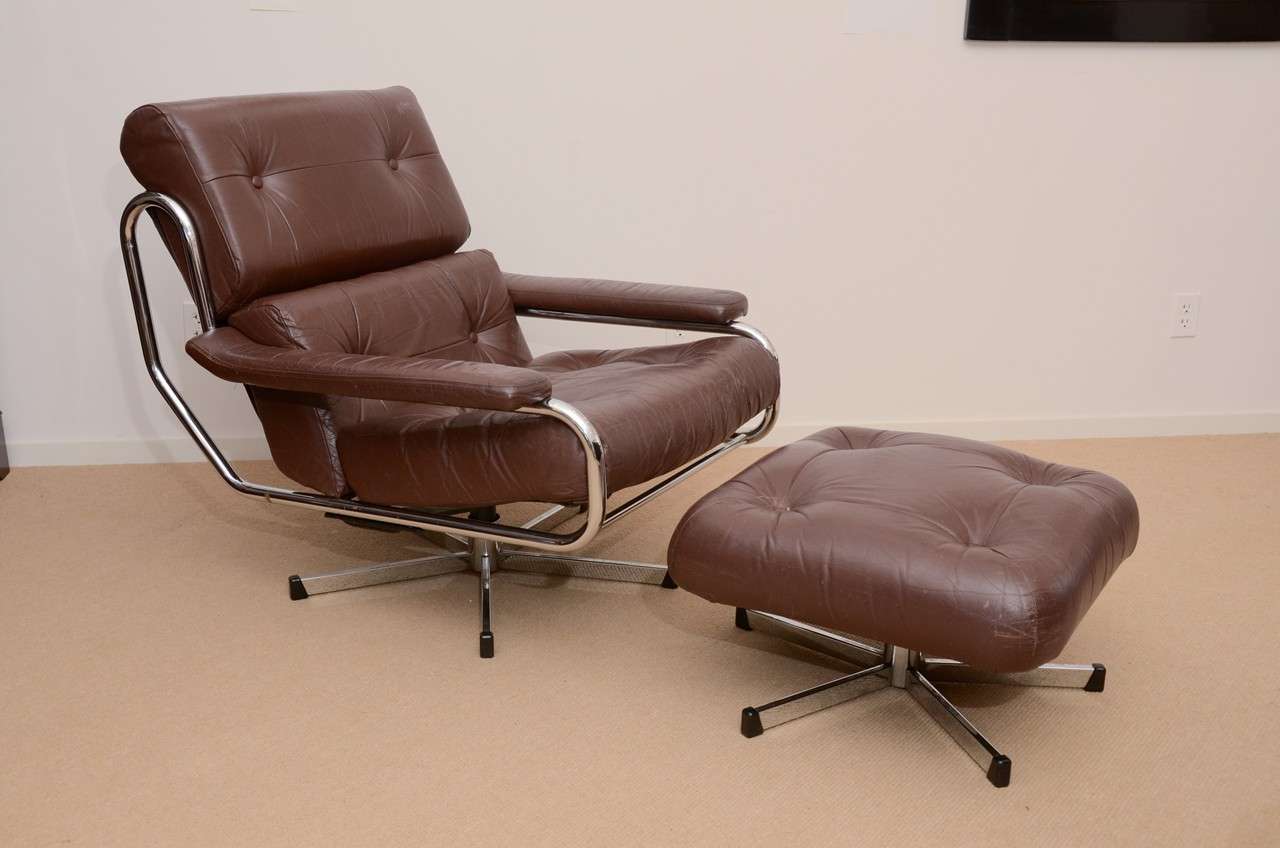 Pieff was one of the most important manufacturers of high end British furniture during the 60's and 70's - designed primarily for Harrods and Heals. Two loose back cushions and one loose seat cushion. All buttoned in soft brown leather in a