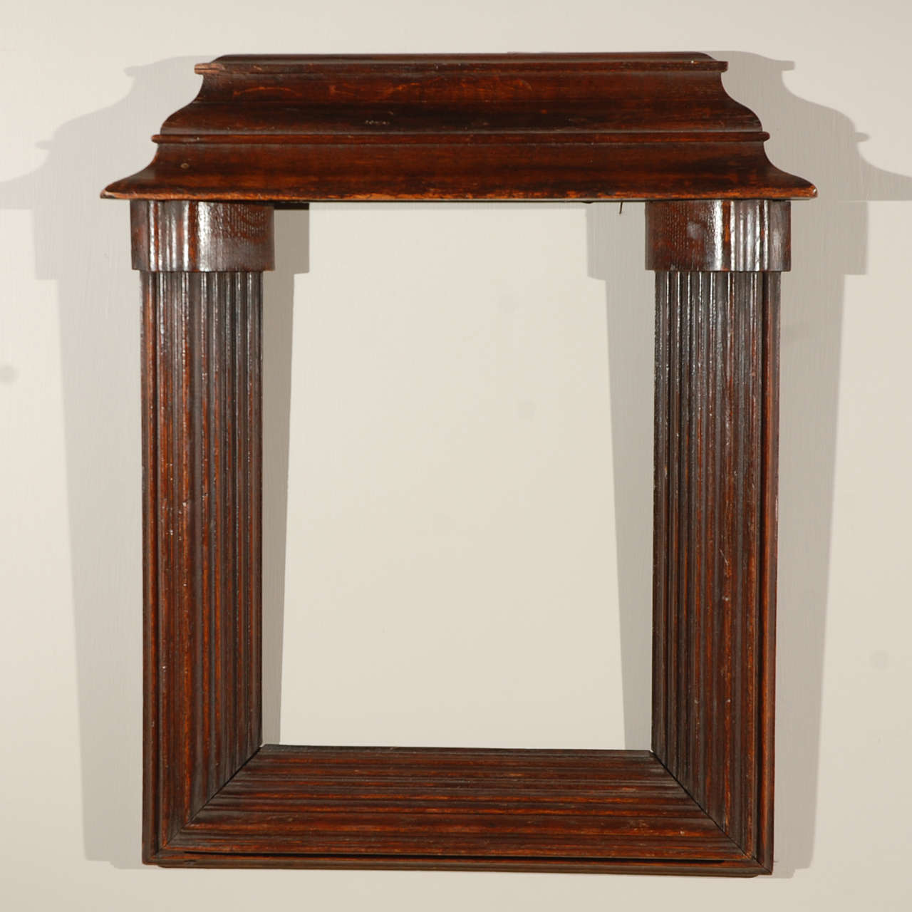 Cornice top rectangular reeded art or mirror frames in oak.