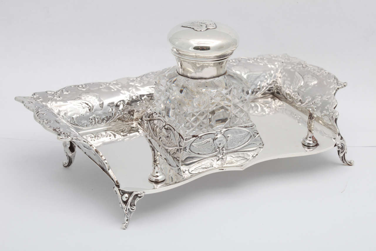 British Victorian, Sterling Silver Footed Cherub-Motif Inkstand By William Comyns For Sale