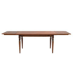 Refined Italian Teak Extendable Dining Table with Brass Accents