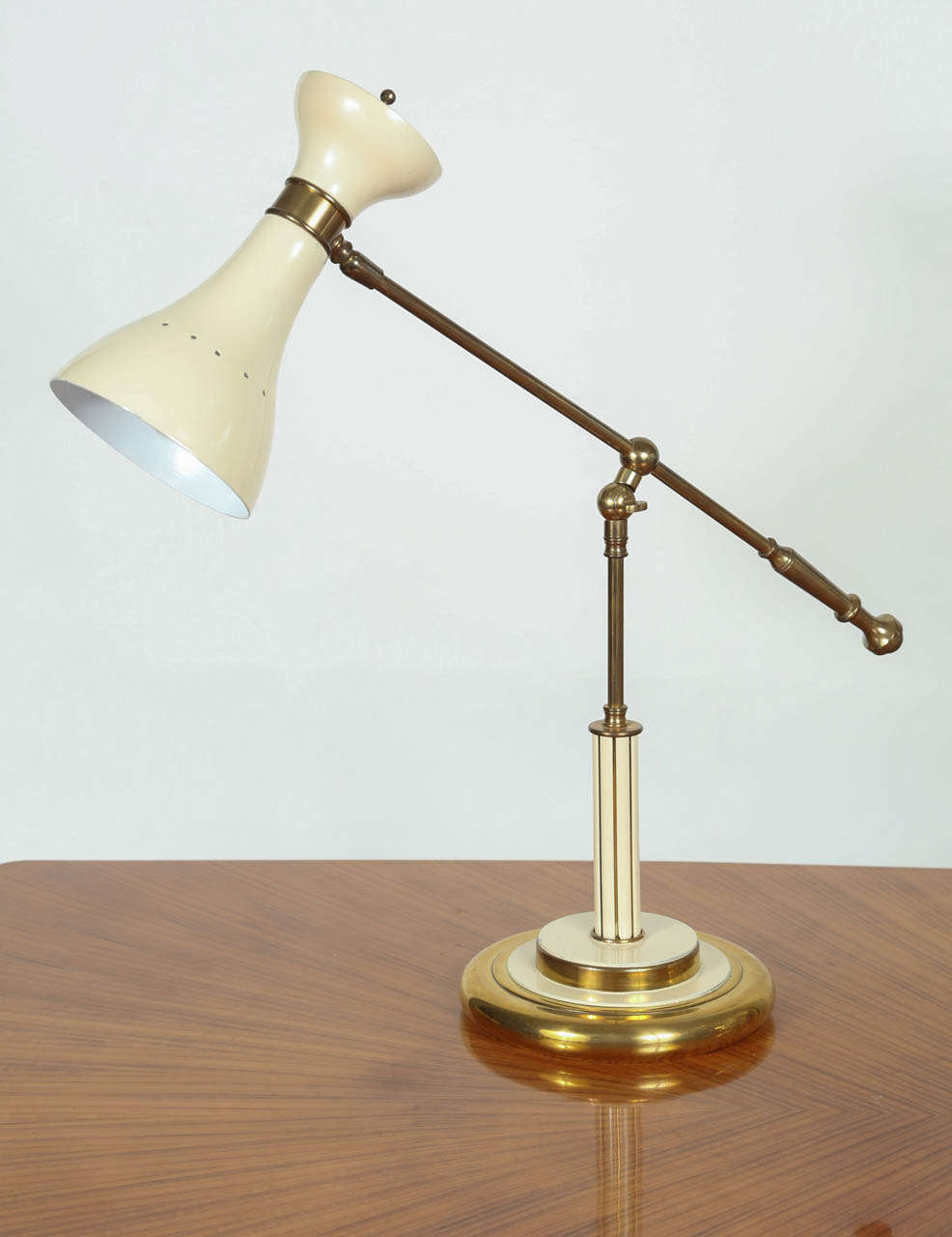 Beautiful adjustable 2 tone brass lamp with beige lacquer.