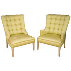 A Pair of Mid-Century Upholstered "His and Her" Chairs