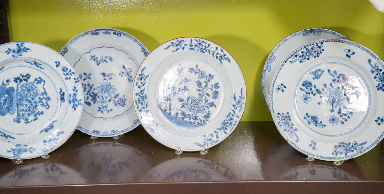 A set of blue and white Chinese export porcelain plates, each with a different scene, 19th century. Priced separately.