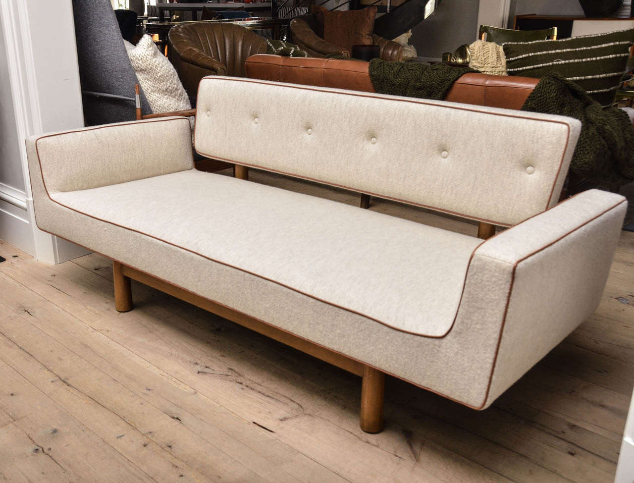Beautiful  Mid-Century Ed Wormley Sofa newly re-upholstered in a boiled wool with leather piping.