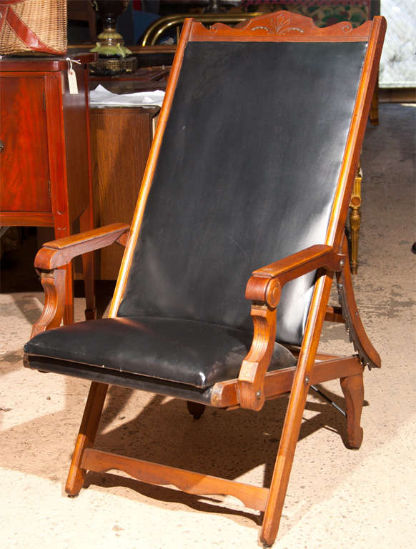 TURN OF CENTURY RECLINING ARM CHAIR- COULD BE BARBER CHAIR- BLACK LEATHER - WALNUT WOOD-  RATCHET TYPE MECHANISM