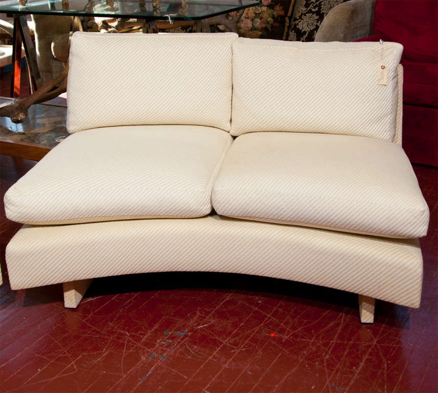 Pair  Of  Curved  Armless  Sofas