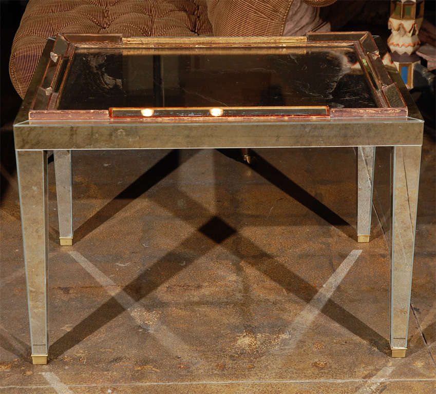 1930s French mirror that has been converted into a coffee table. Table base is new.