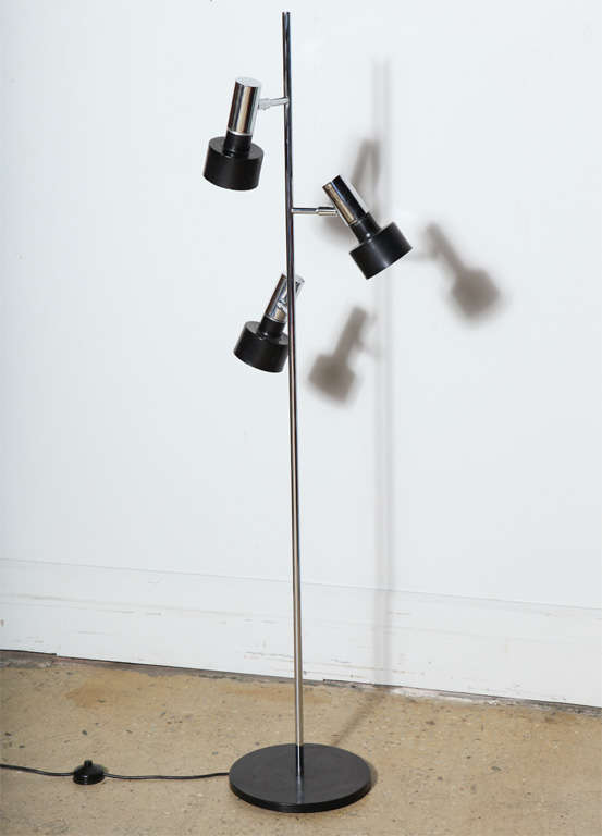 Tall Adjustable Chrome and Black Enamel Reading Floor Lamp with Three Head Shades in the style of Jo Hammerborg for Fog & Morup. 1960's. Featuring a chrome stem, 3 adjustable, individual  Chrome and Black enameled 4D spotlight shades on a round 11D