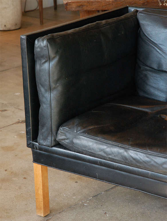 a beautifully designed danish loveseat in it\'s original buttery lambskin. perfect proportions throughout.