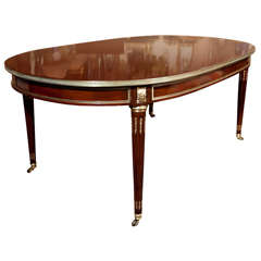 French Mahogany Oval Dining Table by Jansen