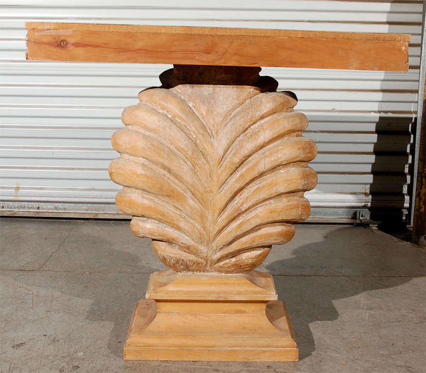 A shell pedestal base console table designed by Edward Wormley for Dunbar ca. 1940's with a delicate ocean wave border