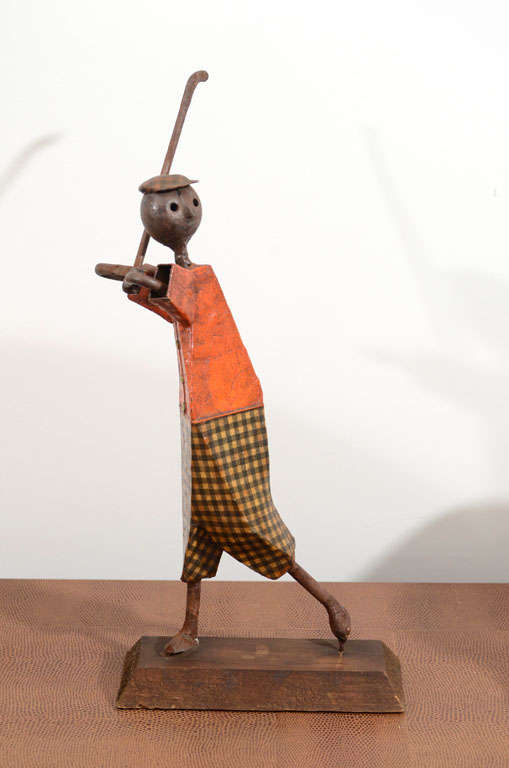 Golfer sculpture by modernist artist Manuel Felguerez.  Signed.  Mexico, circa 1960.<br />
<br />
Finely detailed and whimsical.  Painted bronze on wood base.