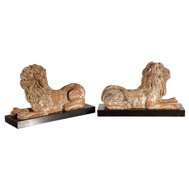 Late 17th to Early 18th Century Carved Seated Lions For Sale