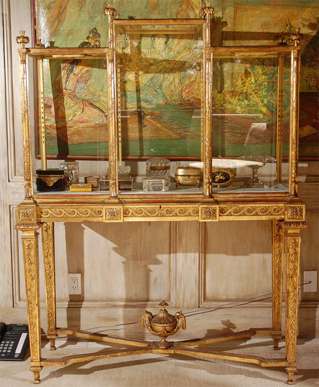 A Very Rare and Exquisite pair of French 19th c. Carved Giltwood and Glass Vitrines/Display Cabinets from a Paris Jeweler of the 19th century. Original Mirrored Backings are not in Photograph but are included.