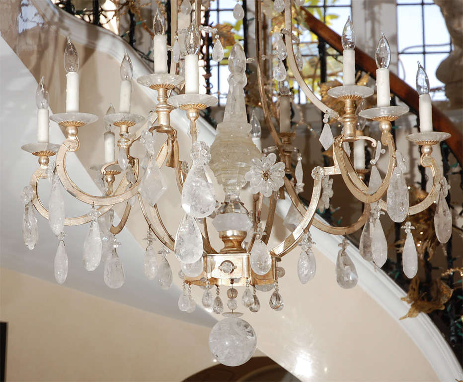 Large 22-karat white gold rock crystal chandelier with very fine quality rock crystals and obelisk center detail. Can be customized to order (finishes/rock crystal elements) and available in 3 sizes. The chandelier in the photo is a large priced at