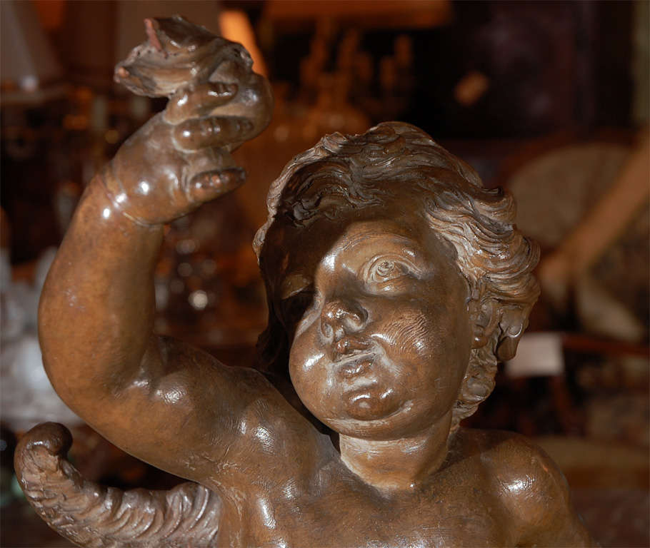 19th century Very finely sculpted French Terra Cotta Cherub
