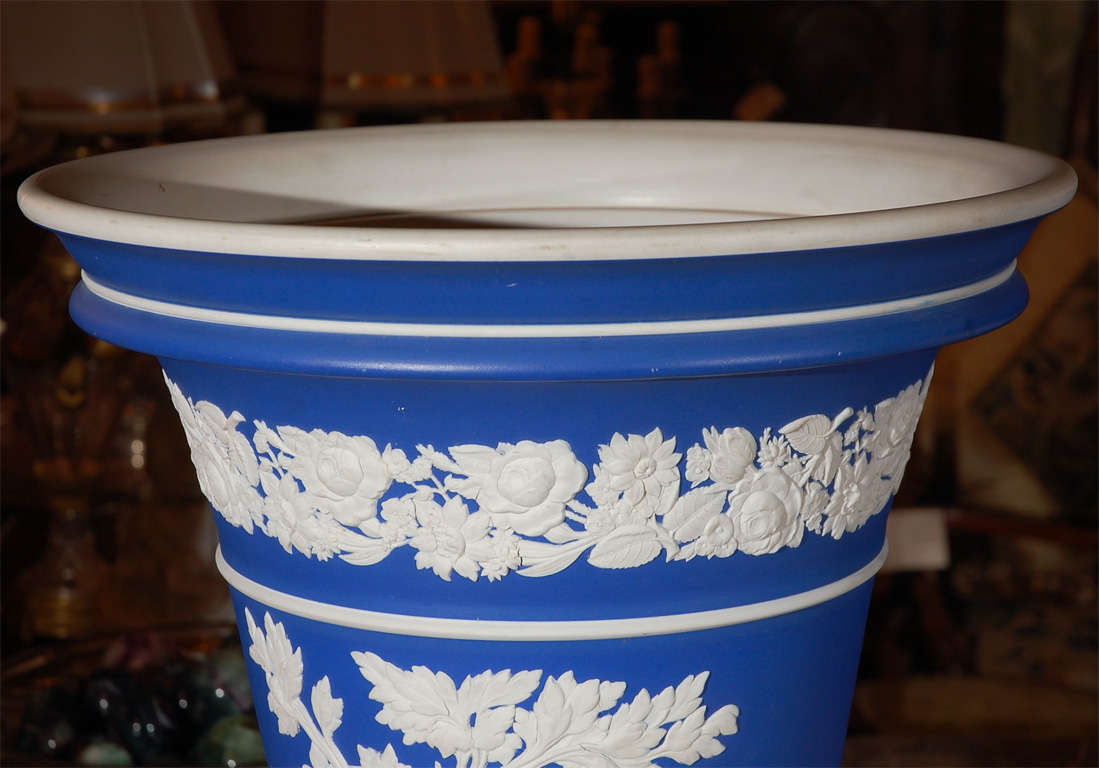 Pair of early 19th century Wedgwood Stamped Porcelain Jardinieres of Large Size with a Matte Finish. The base measures 10 inches.