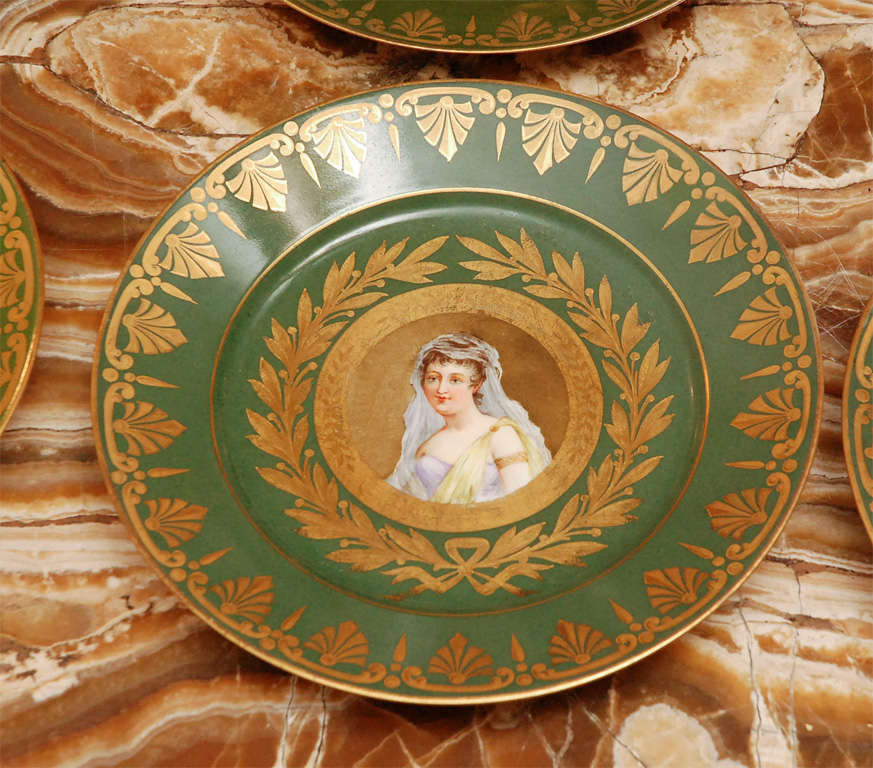 Group of 8 Sevres Porcelain Plates.  Hand Painted and Gilded.  Signed.