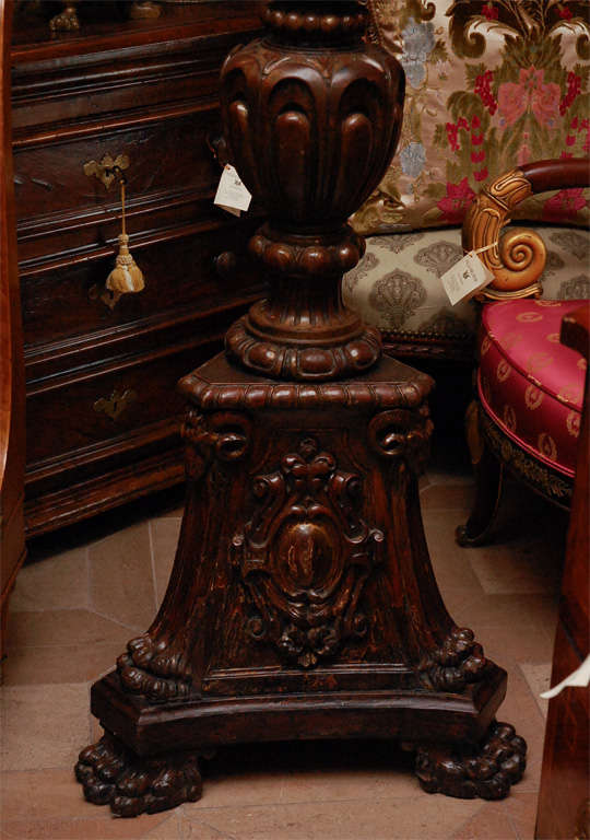 Very Finely Carved Walnut Torchieres. 
The top measurement of the Torchiere is 12 inches. 
The bottom measurement of the Torchiere is 22 inches.