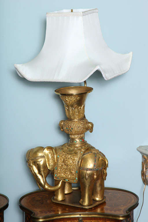 A  pair of ceremonial elephant lamps, late 19th century. 1